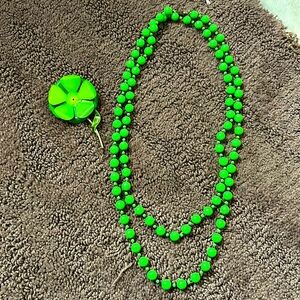 Retro green necklace with flower pin. Costume jewelry